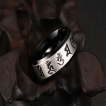 Bague homme noire en acier à bandeau bouddhisme