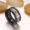 Bague homme noire en acier  pourtour de filins et grille