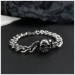 Bracelet homme acier  mailles cubaines et tte de mort