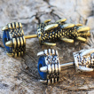 Faux écarteur oreille à oeil de démon et griffes