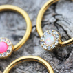 Piercing anneau CBR dor avec opale synthtique sertie