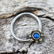 Piercing anneau CBR fleur vintage à opale bleue (septum / oreille...)