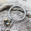 Piercing anneau CBR fleur vintage à opale bleue (septum / oreille...)