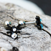 Piercing cartilage tragus helix à araignée noire sertie