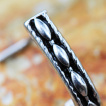 Piercing nez tige L à reliefs ovales