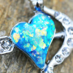 Piercing nombril arc de cupidon à coeur d'opale bleu