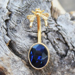 Piercing nombril doré à papillon et pierre bleu saphir