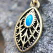 Piercing nombril dor  pendentif tribal oval