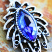 Piercing nombril feuille tropicale à zirconium bleu saphir