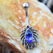 Piercing nombril feuille tropicale à zirconium bleu saphir