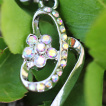 Piercing nombril fleur mystérieuse à strass aurore boréale