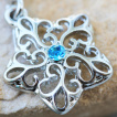 Piercing nombril à lune emaillée et pendentif étoile arabesque
