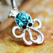 Piercing nombril pieuvre couronnée à strass bleu