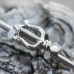 Piercing oreille industriel trident Poseidon