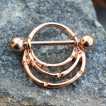 Piercing téton cuivré à design style branches