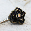 Piercing téton à embouts fleurs antiques serties