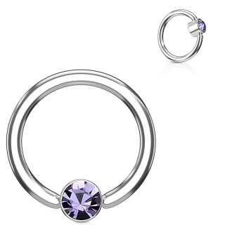 Anneau  cylindre captif serti d'un cristal violet tanzanite