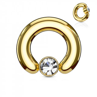 Anneau carteur dor  cylindre captif serti d'un cristal