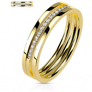 Bague femme en acier doré à triple ligne dont une pavée de zirconiums