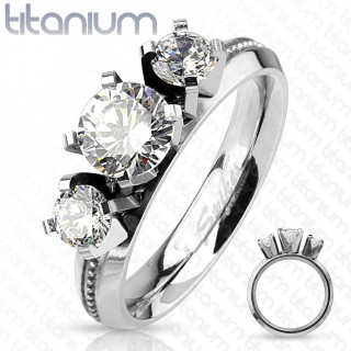 Bague femme en titane  trio de zirconiums et coutours pointills