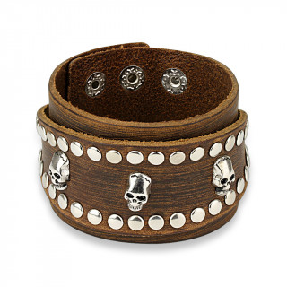 Bracelet en cuir marron aspect usé à bande ovale rivetée avec inserts tête de mort