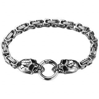 Bracelet homme en acier à maillons et têtes de mort avec fermoir à anneau