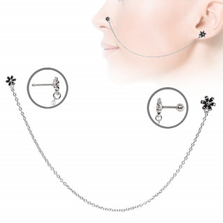 Double piercing nez et oreille à fleurs