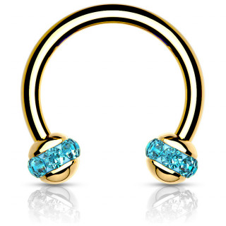 Piercing fer  cheval dor  boules cercles de cristaux bleus aqua