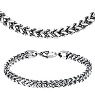 Parure collier et bracelet acier à mailles en "V" tressées