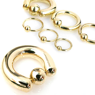 Piercing anneau captif plaqué or
