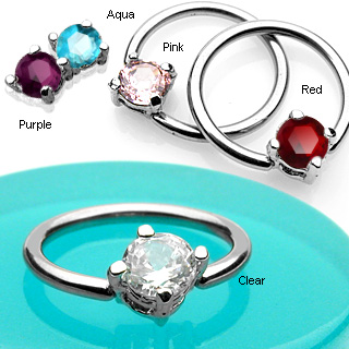Piercing anneau captif serti d'une pierre ronde
