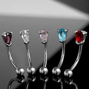 Piercing arcade boule et pierre ovale