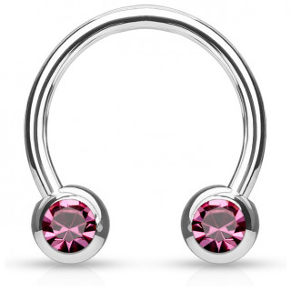 Piercing fer  cheval en acier serti deux cristaux roses