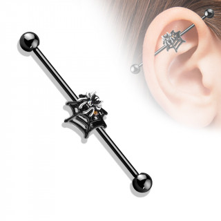 Piercing industriel noir  araigne sertie sur sa toile