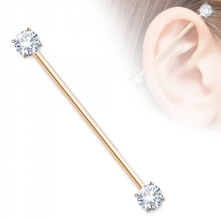 Piercing industriel plaqué or rose à embouts zirconiums
