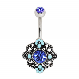 Piercing nombril fleur bleue style ornemental