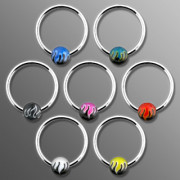 Piercing anneau captif motif flamming